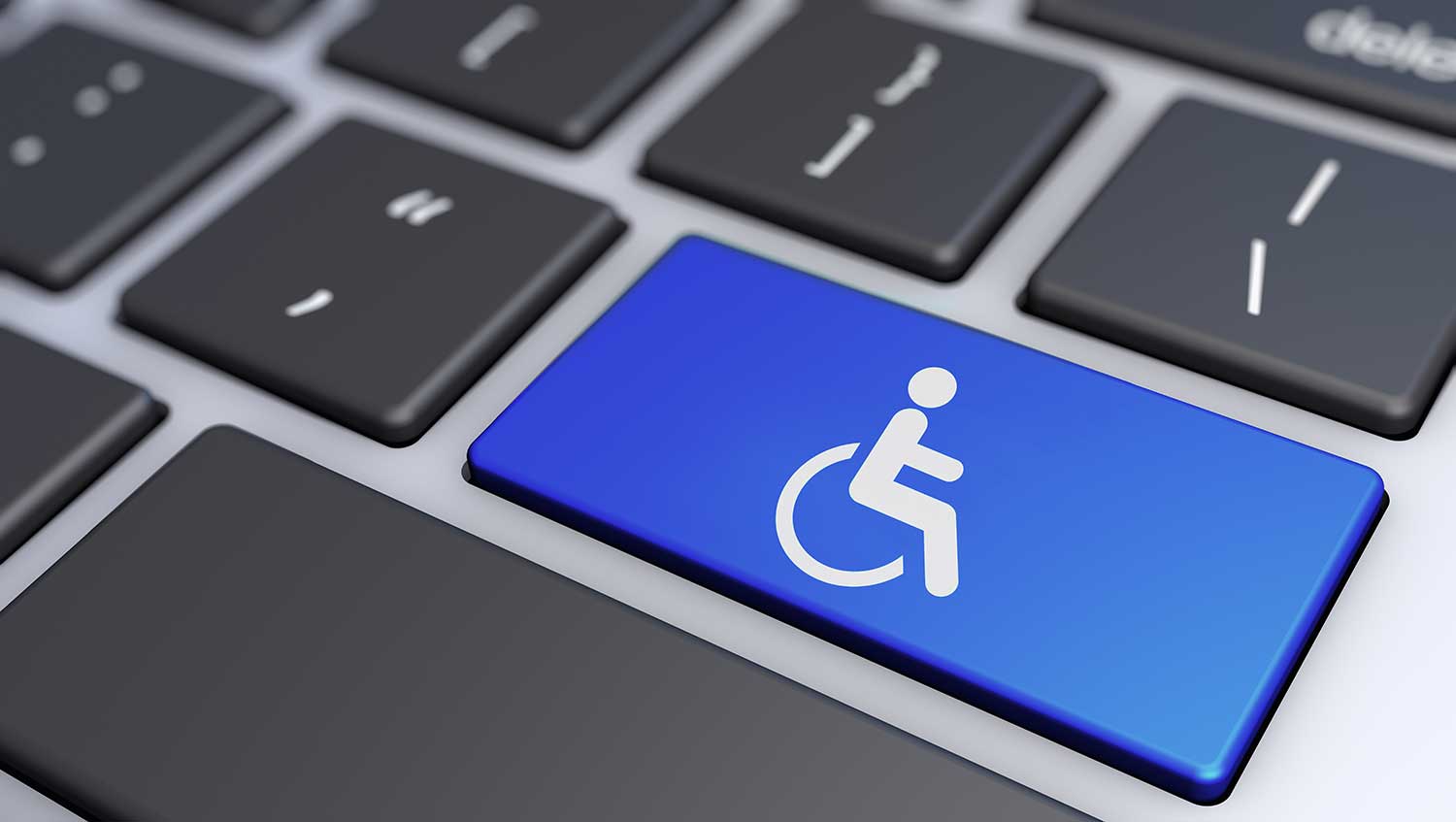 Computer Keyboard Return Key Displaying Accessibility Logo of wheelchair user